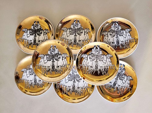 Piero Fornasetti Piero Fornasetti Set of Eight Coasters of Roman Chariots on a Gold Ground with Gold Box, 1960s SOLD •