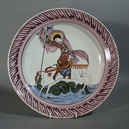 Dutch Delft dish decorated with St George & the Dragon,, 19th Century SOLD •