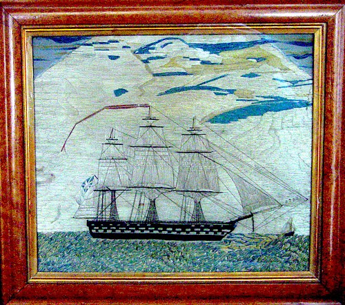A Fine British Sailor's Silkwork Picture of a Ship, circa 1870. SOLD •