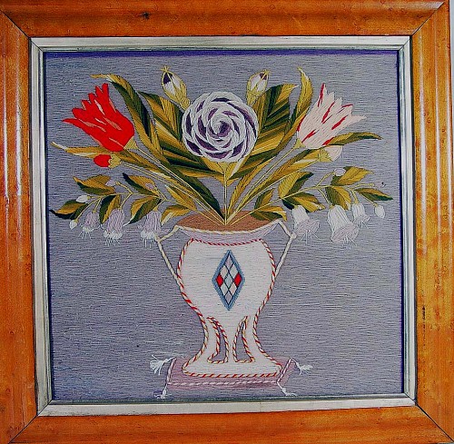 An English Woolwork Picture of Flowers in an Urn, Circa 1840-60 SOLD •