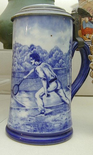 A German Stein decorated with Tennis Players, Circa 1880. SOLD •