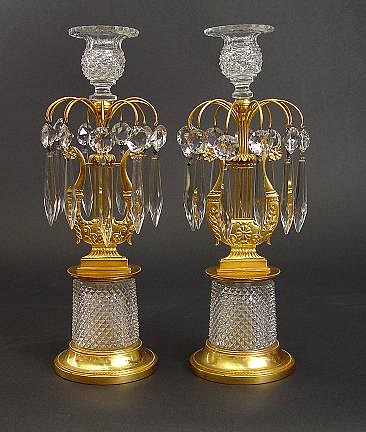 A Pair of Regency Cut Glass and Ormolu Lyre-form Candelabra, Circa 1810-20. SOLD •