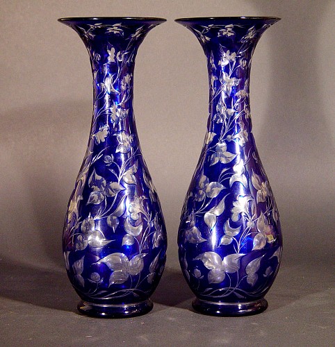 A Pair of Bohemian Cobalt Case Vases with Cut Through Decoration of Floral Swags, Circa 1860. SOLD •
