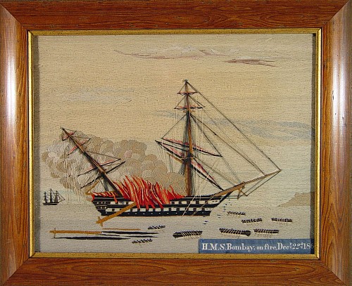 A Remarkable British Sailor's Woolwork Picture of  H.M.S. Bombay on Fire, dated December 22, 1864. SOLD •