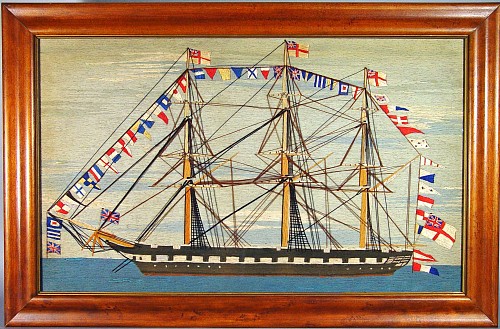 A Large British Sailor's woolwork picture-woolie of a Fully Dressed Ship,
Circa 1870. SOLD •