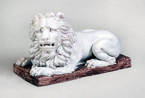 French Tin-glazed Earthenware Large Figure of a Recumbent Lion, 
Late 18th Century. SOLD •