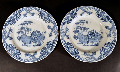 British Delftware English Delftware Plates decorated in Underglaze Blue with Lotus Flowers, Probably London, Circa 1760 SOLD •