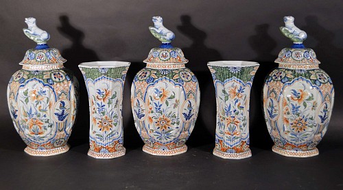 A Garniture of Dutch Delft Vases, late 19th-20th century. SOLD •
