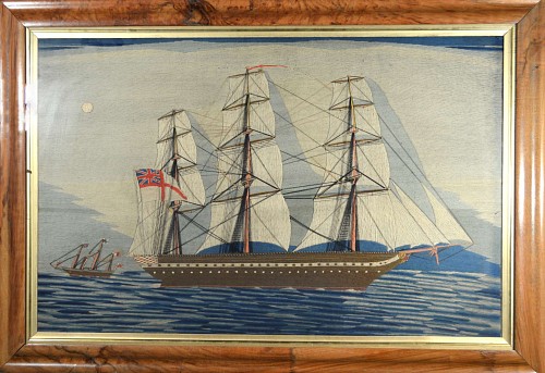 Sailor's Woolwork Sailor's Woolwork Woolie of the  Royal Navy Frigate H.M.S. Warrior  with White Ensign, Old label with the Makers Name., Circa 1881. SOLD •