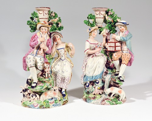 Pearlware Staffordshire Pearlware Pair of Large Candlestick Figure Groups of "Liberty & Matrimony" & "The Flute Player", 1790-1810 $7,000