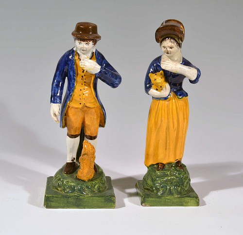 Pearlware Staffordshire Pearlware Figures of A Man & Woman with A Pet Dog & Cat, Circa 1810-20 $1,800