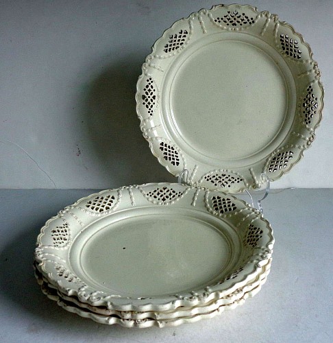 <i>A Set of Four Creamware Openwork Pierced Plates.<br />
Late 18th Century</i><br/> <span class=