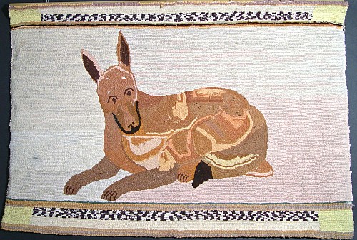 Folk Art American Folk Art Hooked Rug decorated with a Dog, 1890-1920 $950