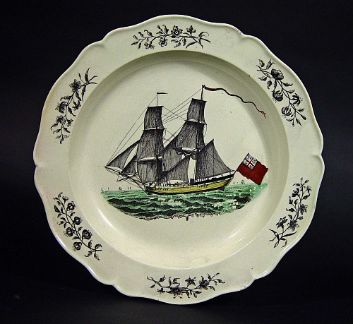 Creamware Pottery An English Creamware Plate decorated with a Frigate Flying The Red Ensign, Probably Wedgwood, Circa 1785-1800 SOLD •
