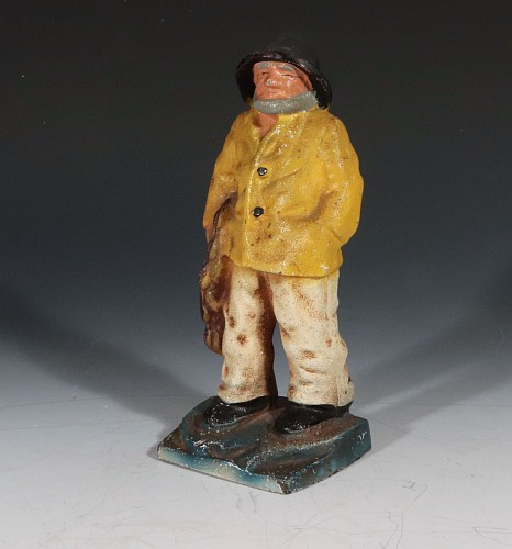 Folk Art American Painted Cast Iron Old Salt Maine Fisherman Doorstop or Bookend, Hubley Manufacturing Company, 1920s $225
