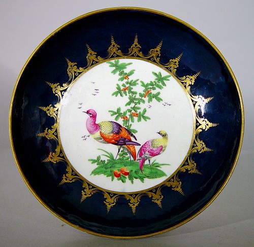 Inventory: First Period Worcester Porcelain English First Period Worcester Porcelain Blue-Ground Exotic Bird-Decorated Cake Plate, Circa 1770 $950