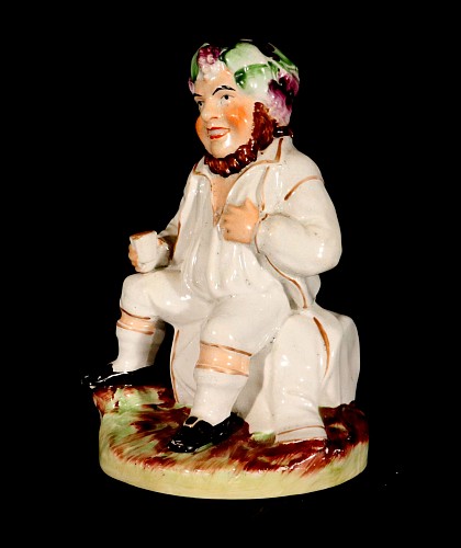 Staffordshire Staffordshire Pottery Figure of Bacchus With Cup on a Wine Barrel, 1860-80 $650
