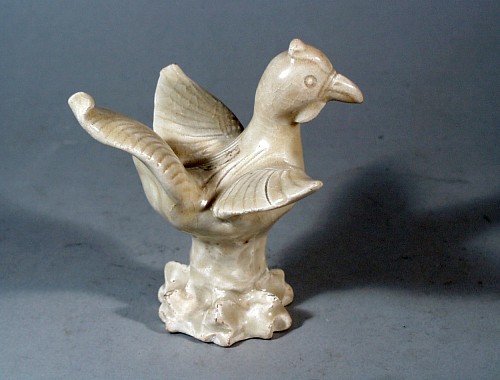 Inventory: Chinese Pottery Chinese Yingqing Stoneware Cream-glazed Model of a bird, Sung Dynasty, 12th Century $2,500
