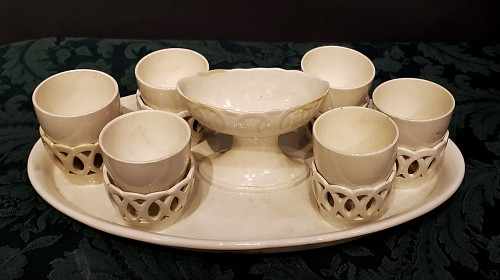 Creamware Pottery Wedgwood Creamware Egg Cup Stand and Six Egg Cups, 1800-20 $1,950