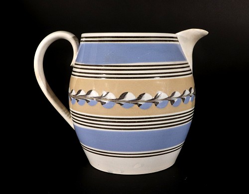 Mocha English Mocha Pottery Blue & Yellow Slip Jug with Cat's Eye Decoration, Early 19th Century SOLD •