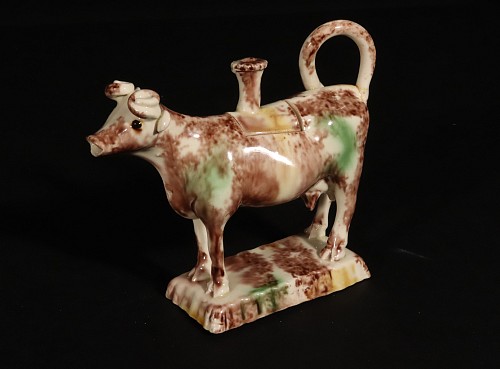Creamware Pottery 18th-century Creamware Whieldon Type Cow Creamer and Cover, 1770 $3,900