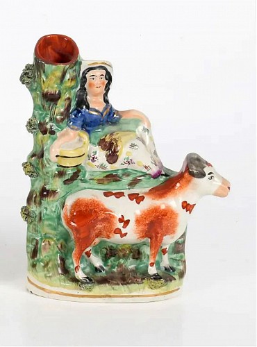 Staffordshire Staffordshire Pottery Cow with Figure of Milk Maid, 1860-80 SOLD •