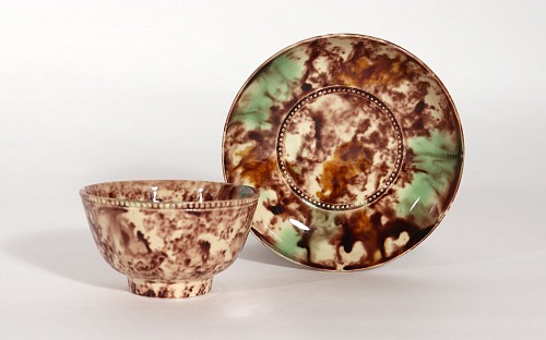 Inventory:  Creamware Pottery, 18th-century English Creamware Whieldon-type Tortoiseshell Tea Bowl & Saucer, 1775, $950