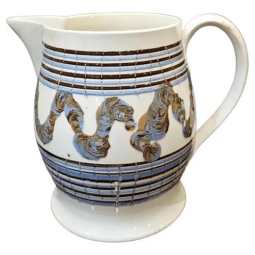 Mocha English Mocha Pottery Creamware Earthworm Jug, 1810 $2,000