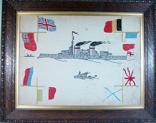 Inventory:  Sailor's Woolwork, World War I Woolwork Picture of a Royal Navy Battleship with Allied Flags, by Corporal Albert E. Wilkinson, Durham Light Infantry, 1915-17, $1,500